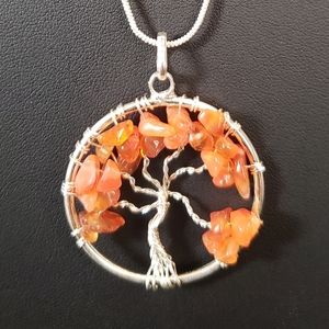 Carnilian Tree of Life Pendant with stainless steel chain.